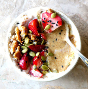 Coconut Porridge Bowl With Strawberries for Breakfast