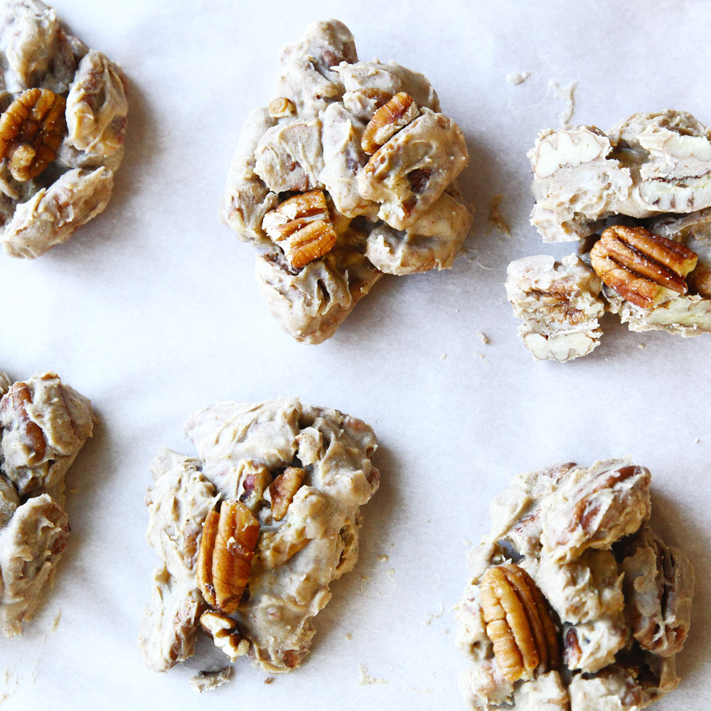 4-Ingredient White Chocolate Pecan Pie Clusters on a sheet pan