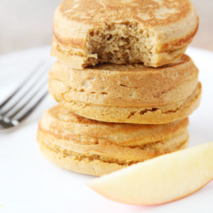 thick fluffy whole wheat applesauce pancakes stacked