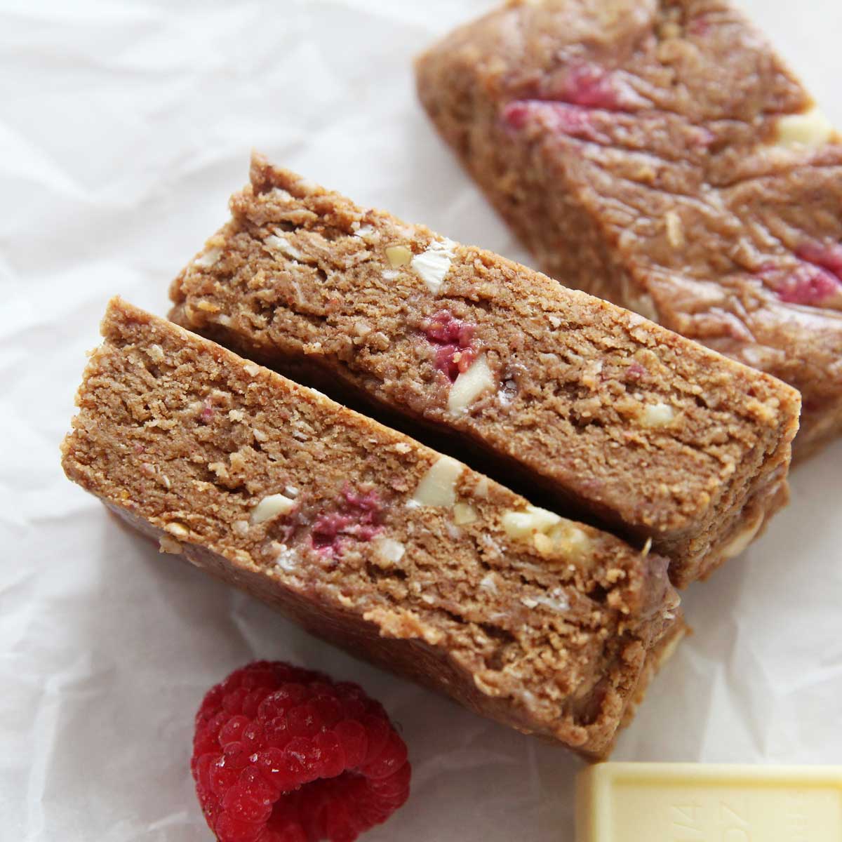 Healthy White Chocolate Raspberry Protein Bars Recipe (Tastes Like Quest Bars!) - Almond Joy Protein Bars