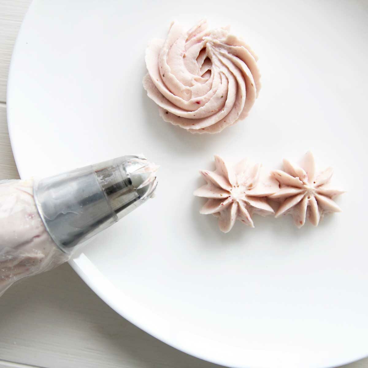 Healthy Low Fat Strawberry Greek Yogurt Frosting piped using closed star tip