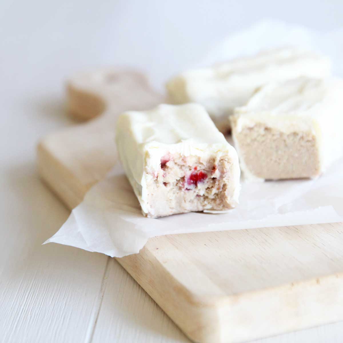 Creamy & Sweet No-Bake Strawberry Cheesecake Protein Bars - Almond Joy Protein Bars
