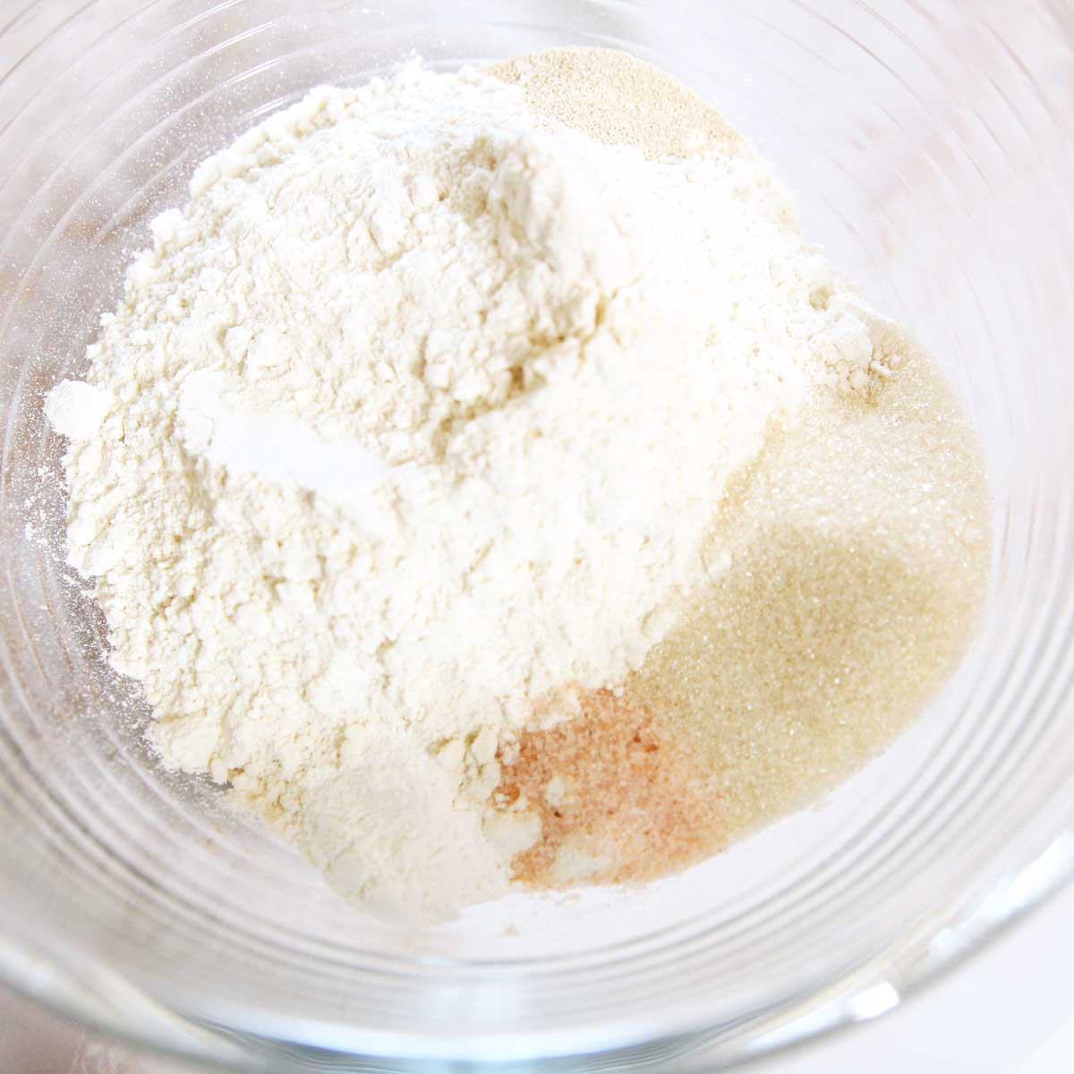 mix all the dry ingredients for yeast glass mixing bowl