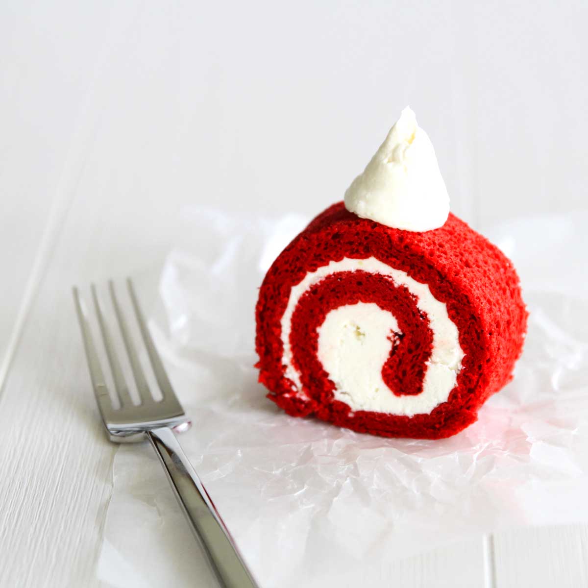 Melt-in-Your-Mouth Red Velvet Roll Cake (Perfect for Christmas!) - Peppermint Whipped Cream