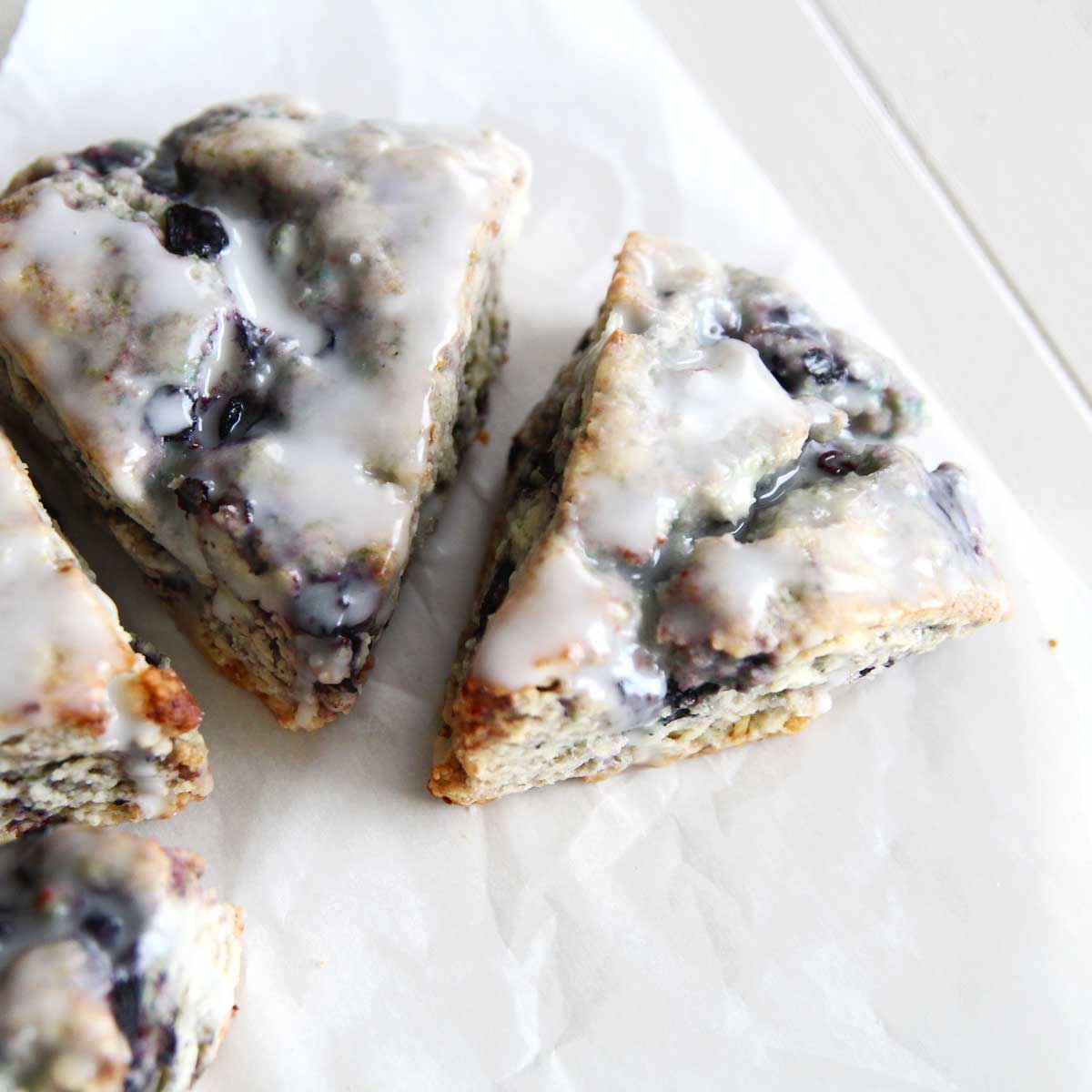 blueberry scones with a simple milk glaze